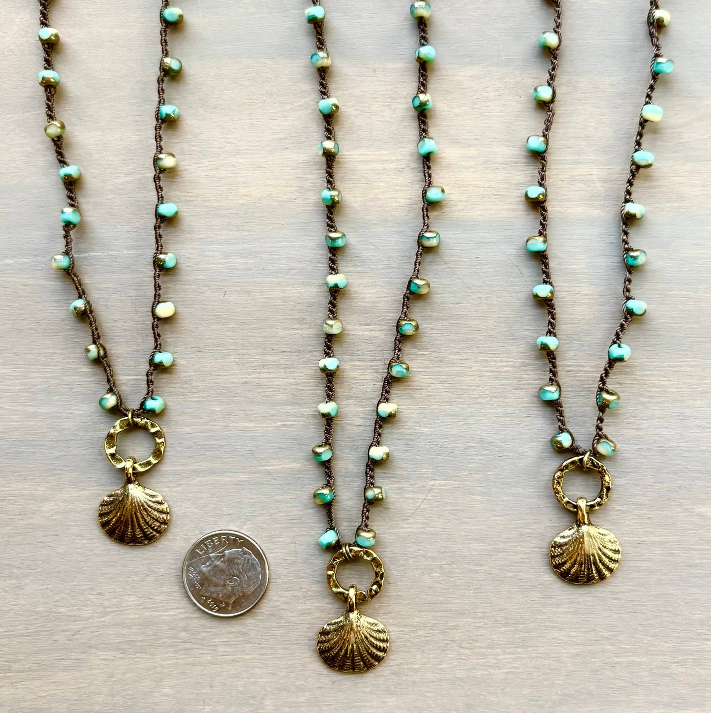 Golden Tropic Shell Necklace For Beach Days And Travel Fun