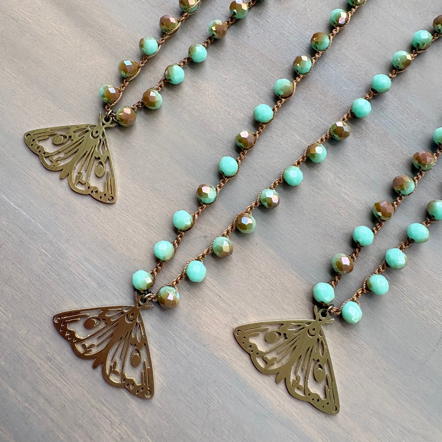 Mystic Moth Pendant On Faceted Czech Crystal Crocheted Strand
