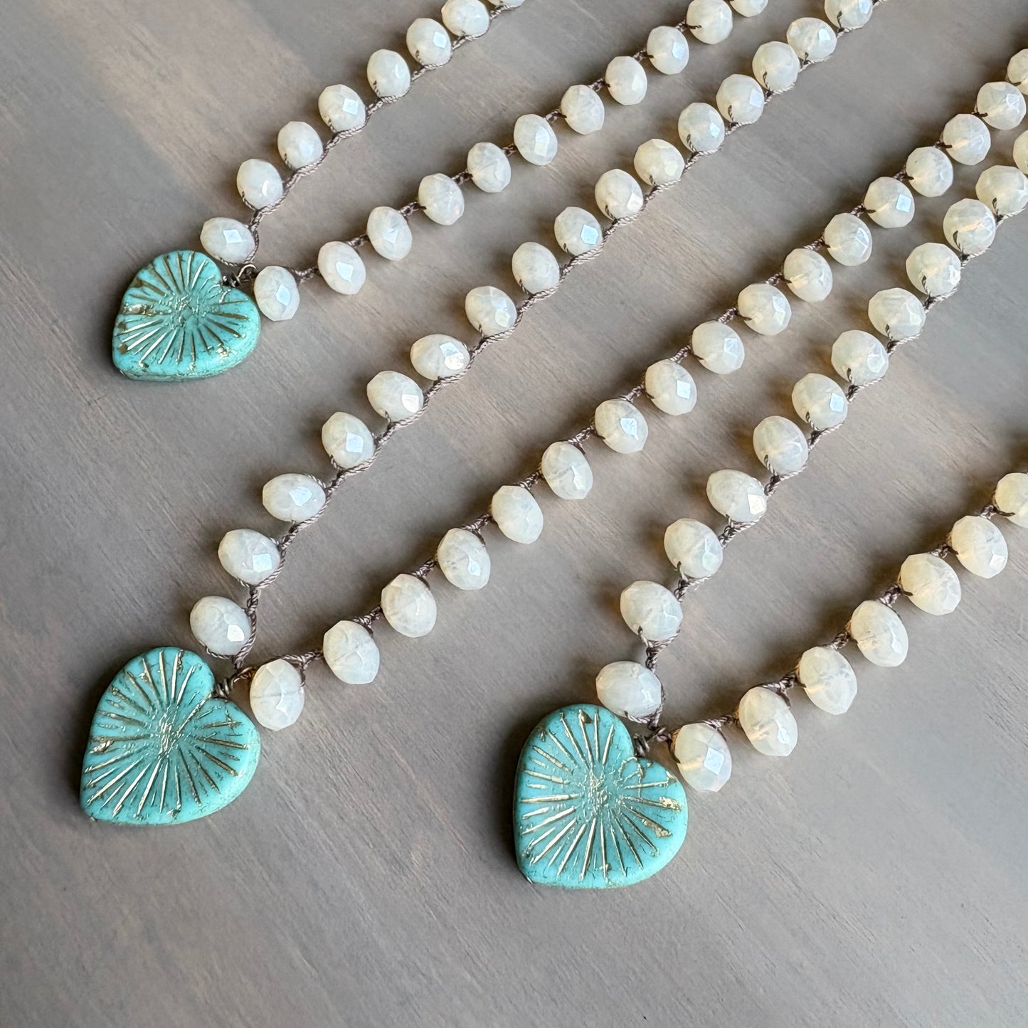 Aqua Starburst Heart Pendant Necklace With Crocheted Peach Opal Crystal