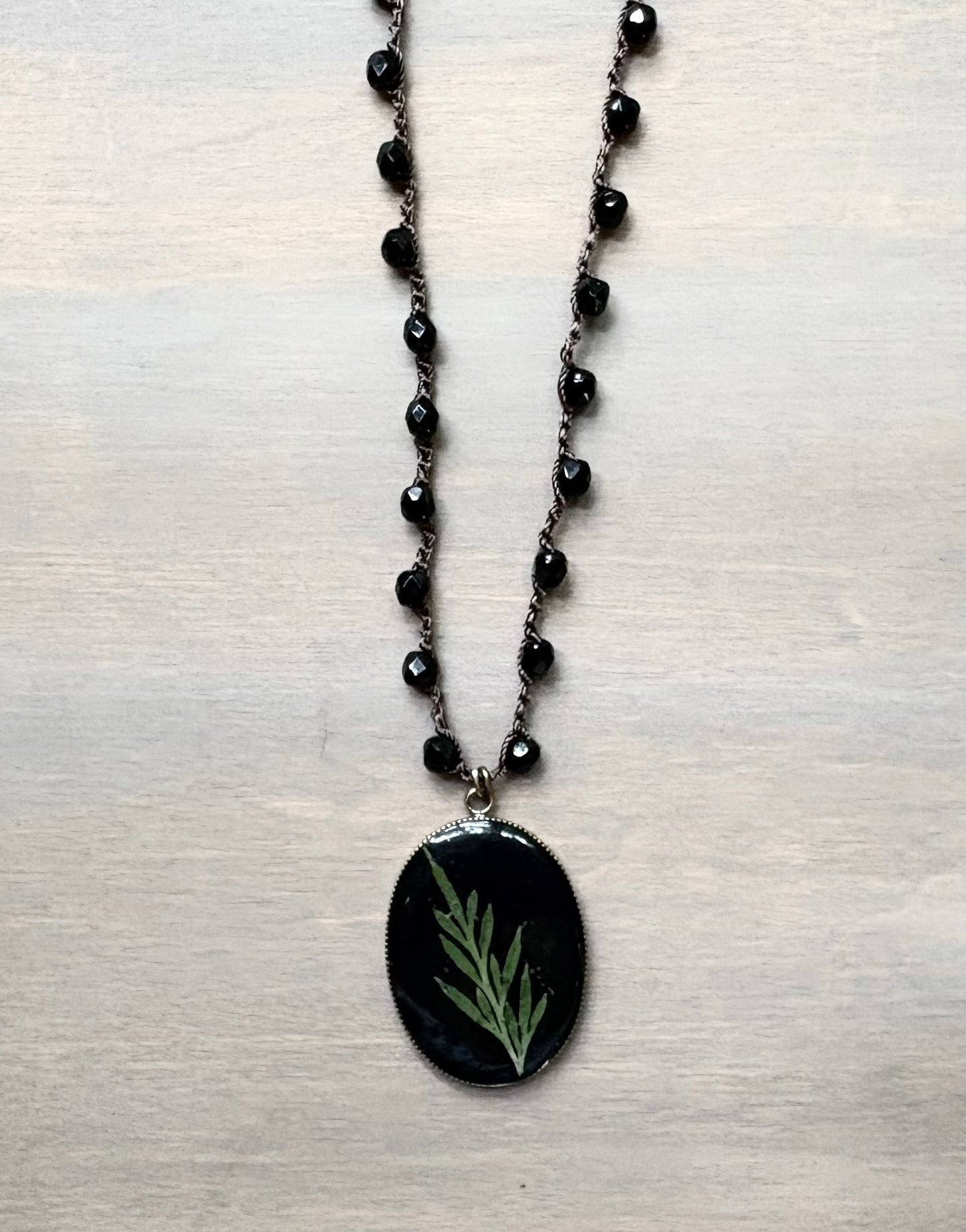 Long Botanical Pendant on Black Crystal, Version 4