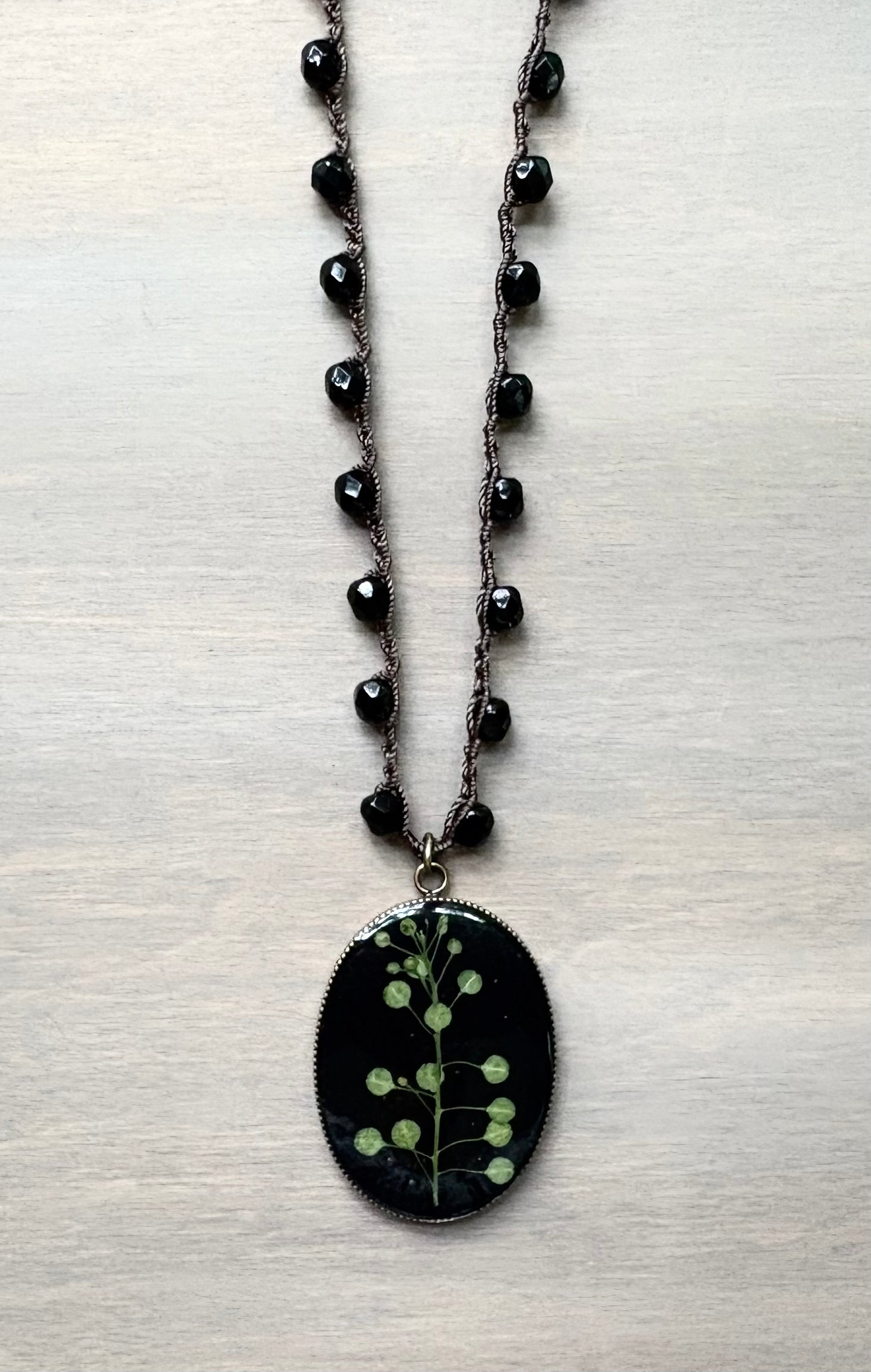 Long Botanical Pendant on Black Crystal, Version 3
