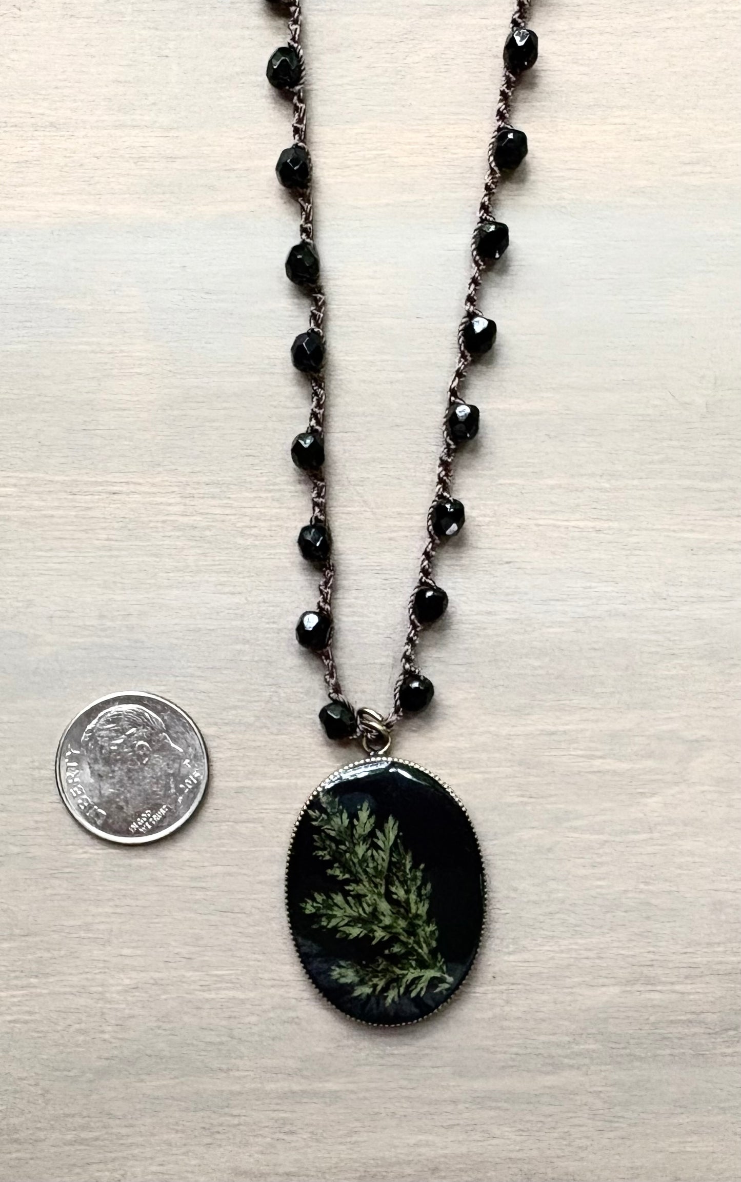 Long Botanical Pendant on Black Crystal, Version 3