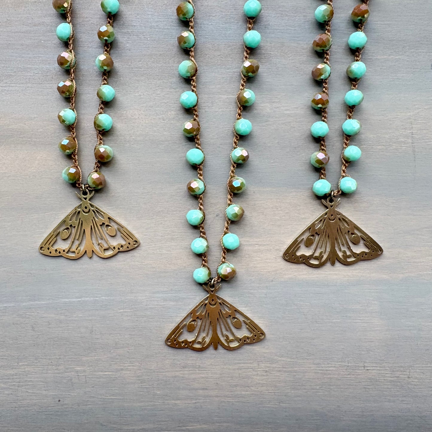 Mystic Moth Pendant On Faceted Czech Crystal Crocheted Strand