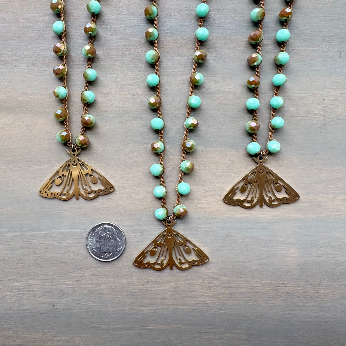 Mystic Moth Pendant On Faceted Czech Crystal Crocheted Strand