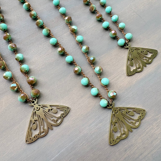 Mystic Moth Pendant On Faceted Czech Crystal Crocheted Strand