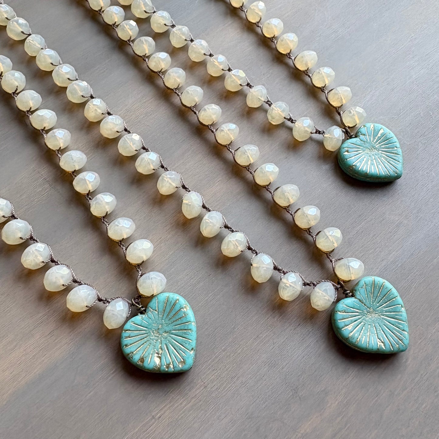 Aqua Starburst Heart Pendant Necklace With Crocheted Peach Opal Crystal