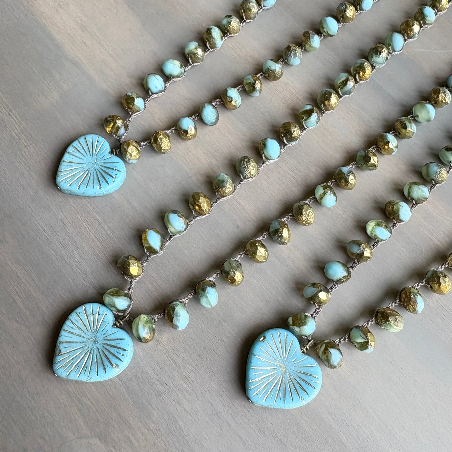 Golden Sky Blue Starburst Heart Necklace With Crocheted Czech Crystal