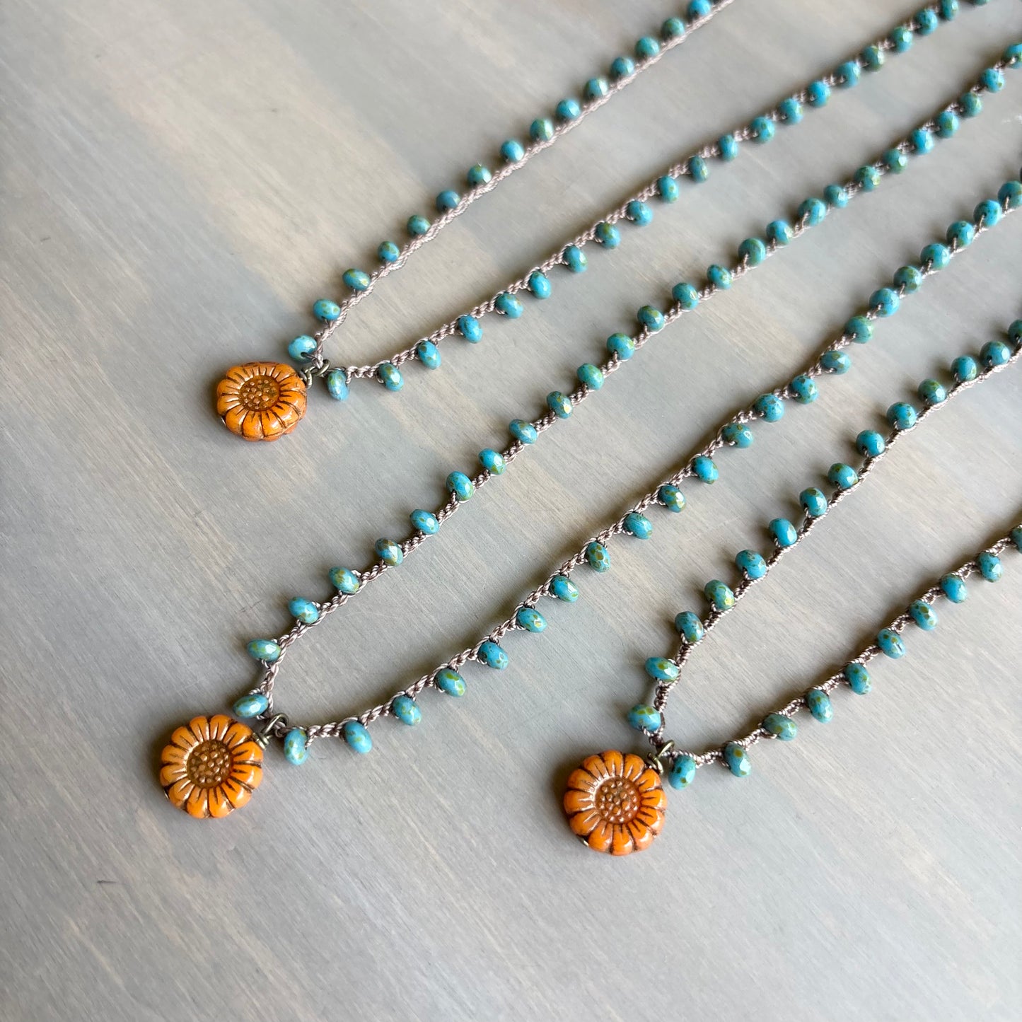 Persimmon Flower Pendant And Crocheted Czech Crystal In Teal