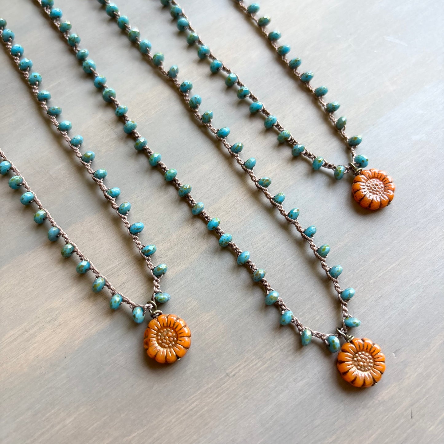 Persimmon Flower Pendant And Crocheted Czech Crystal In Teal