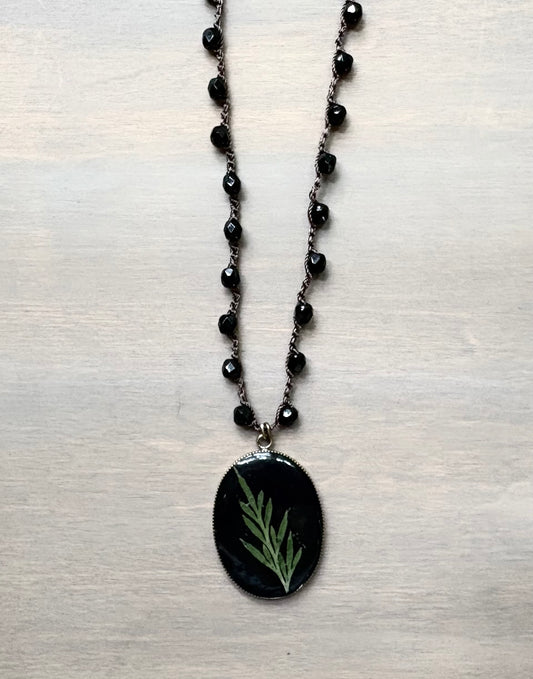 Long Botanical Pendant on Black Crystal, Version 4