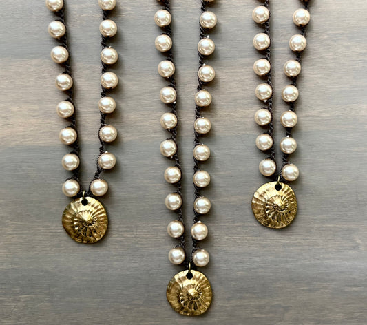 Golden Fossil on Glass Pearls