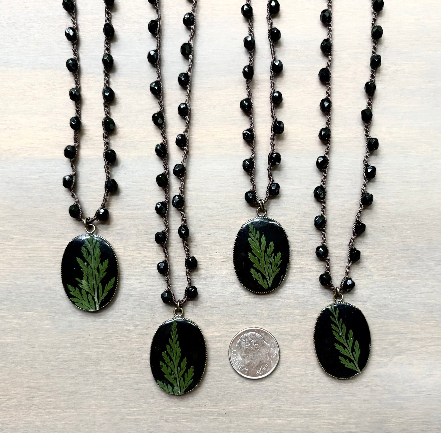 Juniper Botanical Pendant on Black Crystal