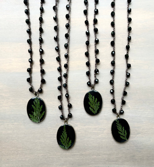 Juniper Botanical Pendant on Black Crystal